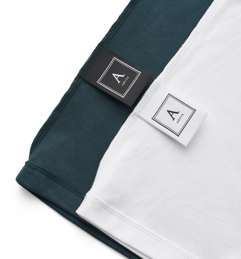 NECK MINI LOGO T-SHIRT（受注予約受付終了）